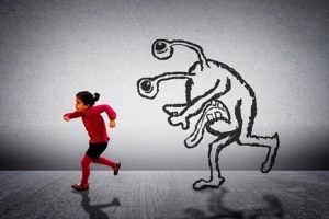 Cartoon monster chasing a child representing IEP or 504 denial